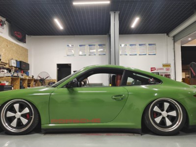 Green Porsche 911 modified AirBFT airride airbag